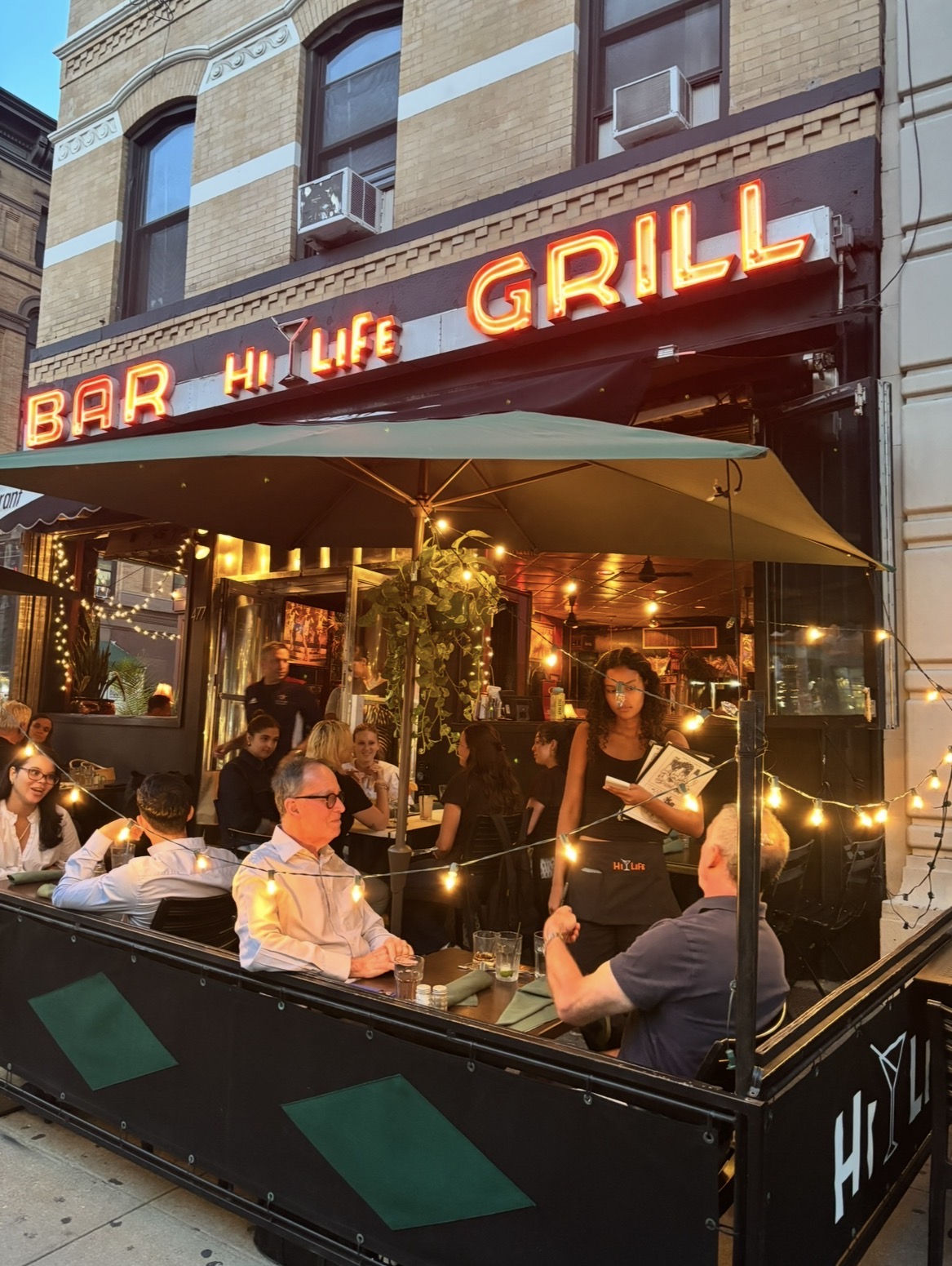 Sidewalk cafe seating at Hi-Life
